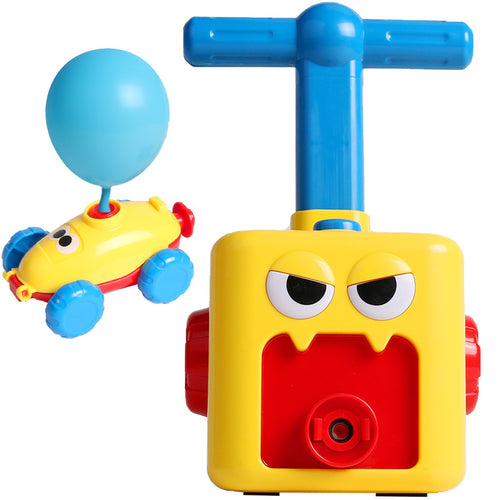 Toy with a blue handle and a small vehicle attached, on a white background